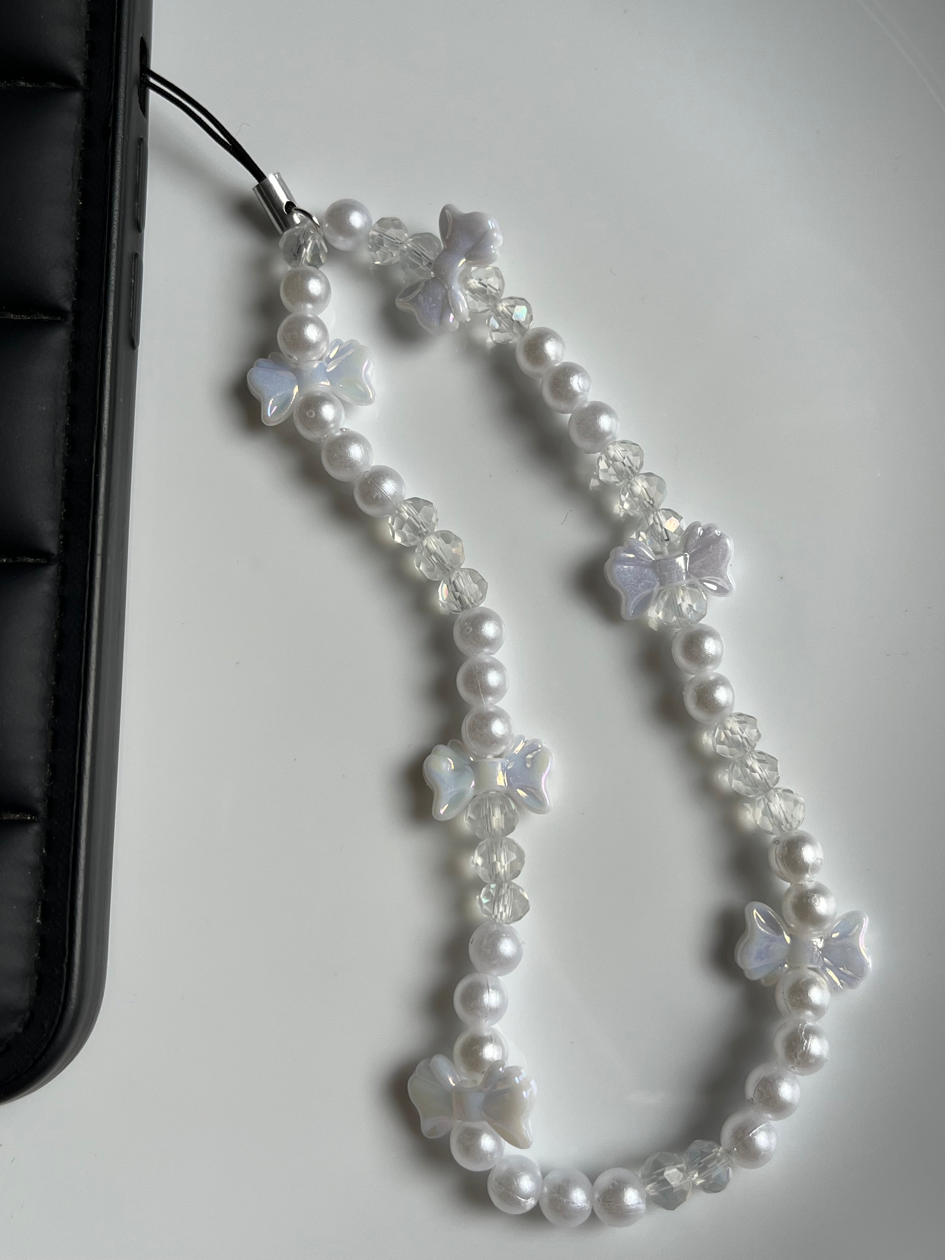 white bow phone charm