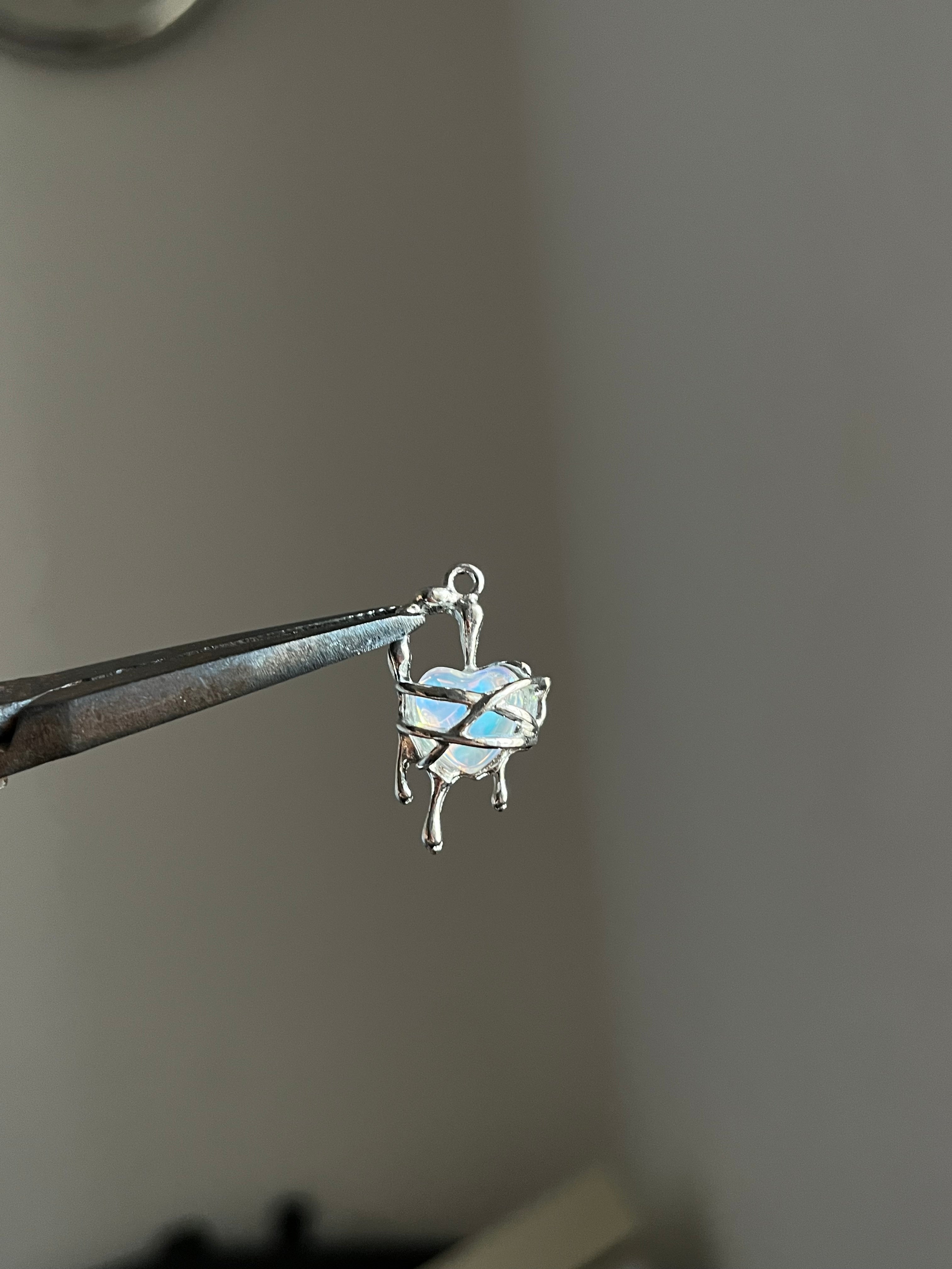 trapped heart charm