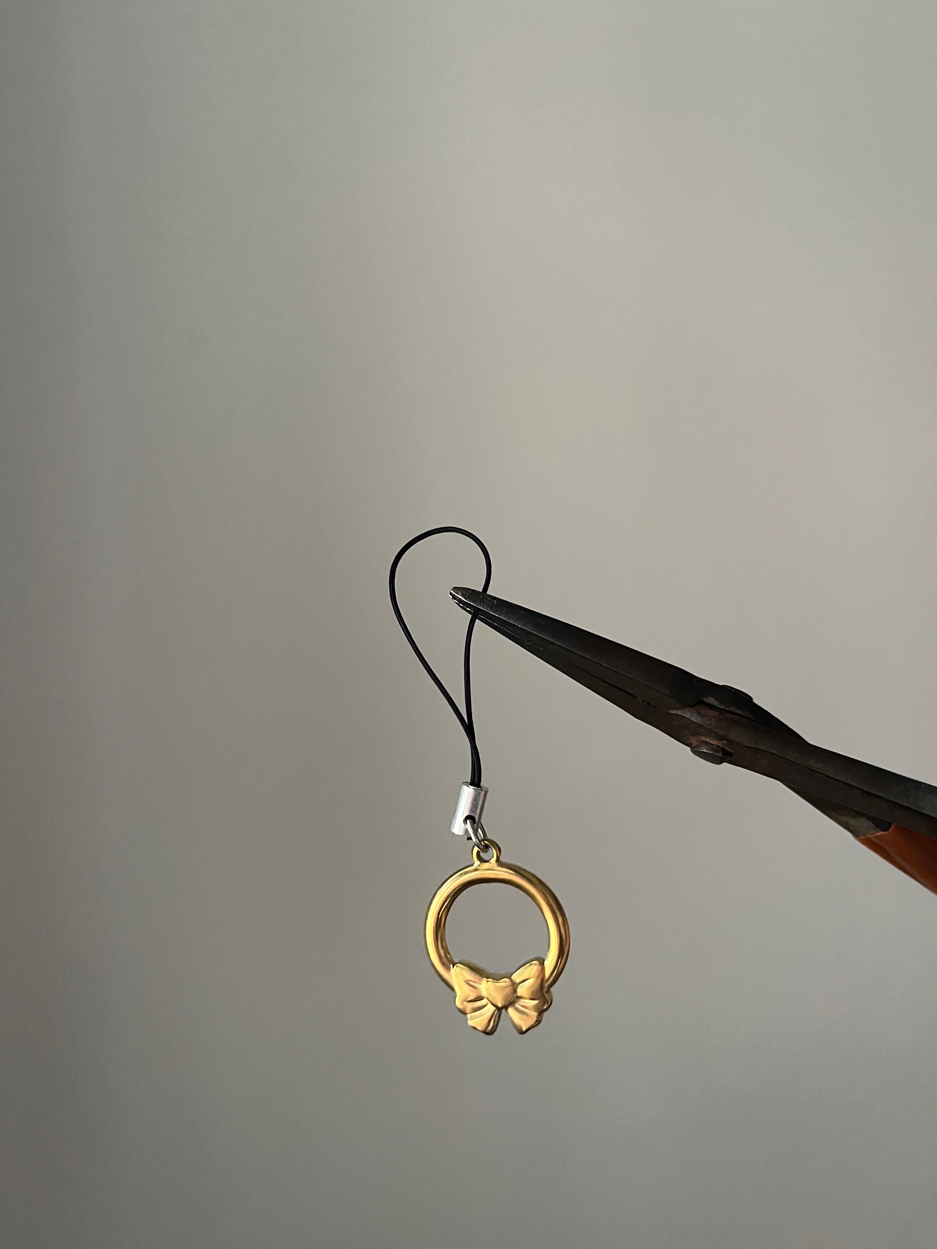 gold bow phone hanging