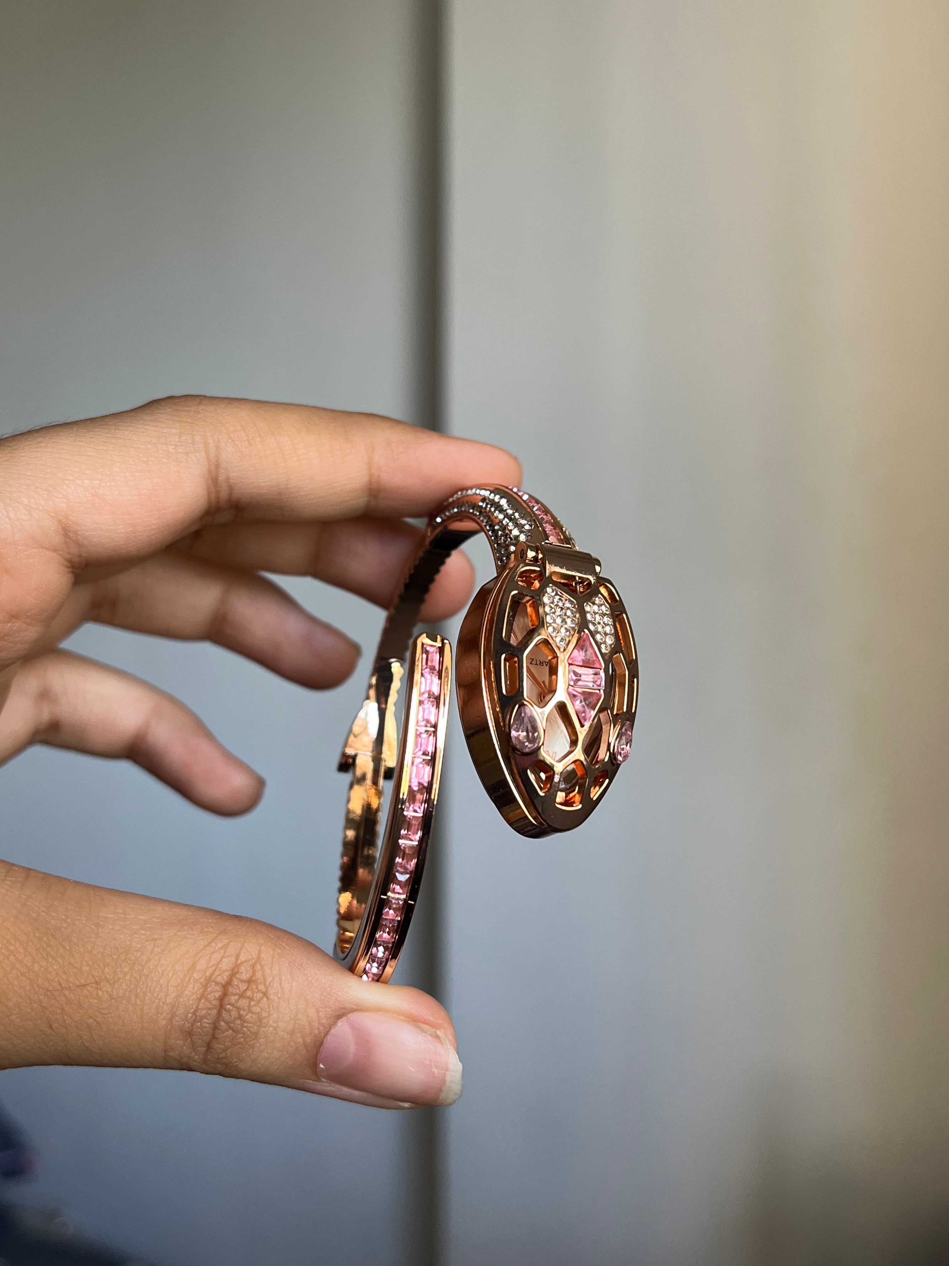 pink openable snake watch