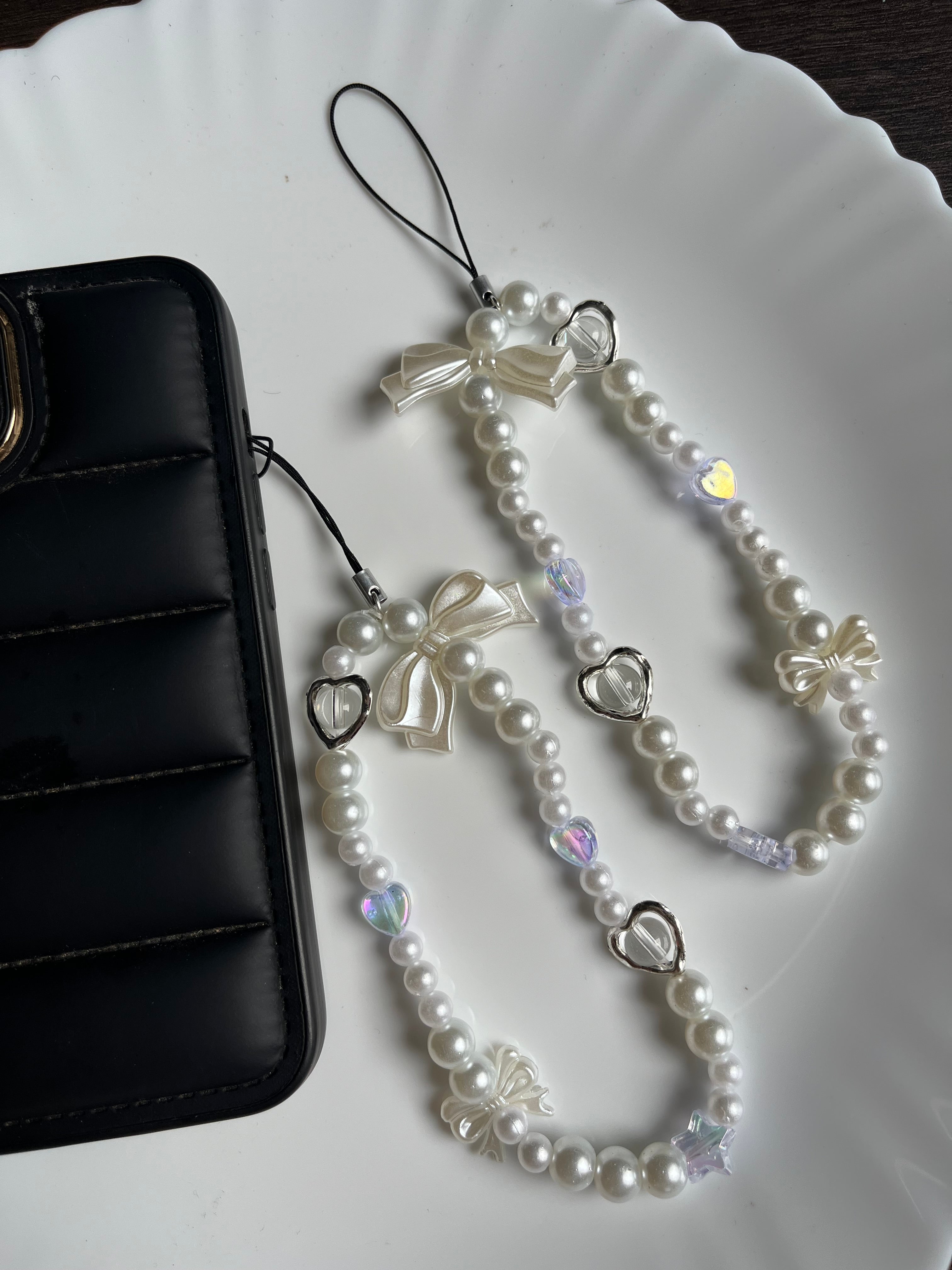 coquette 2.0 phone charm
