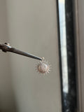 spikey sun charm