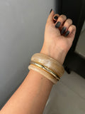 light beige maximalist stack