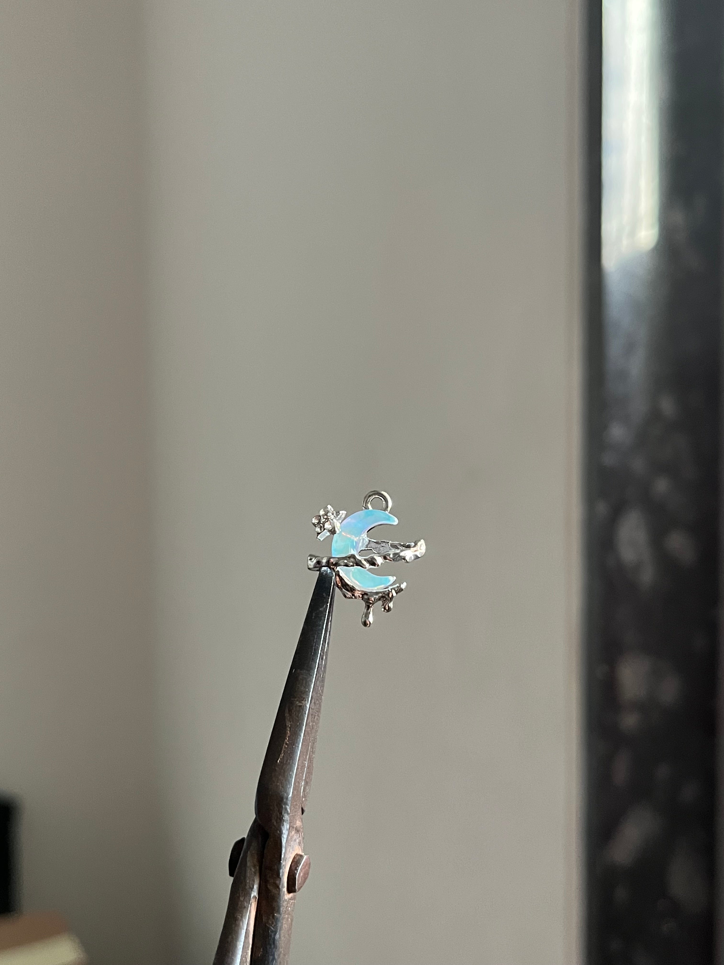 blue drippy moon charm