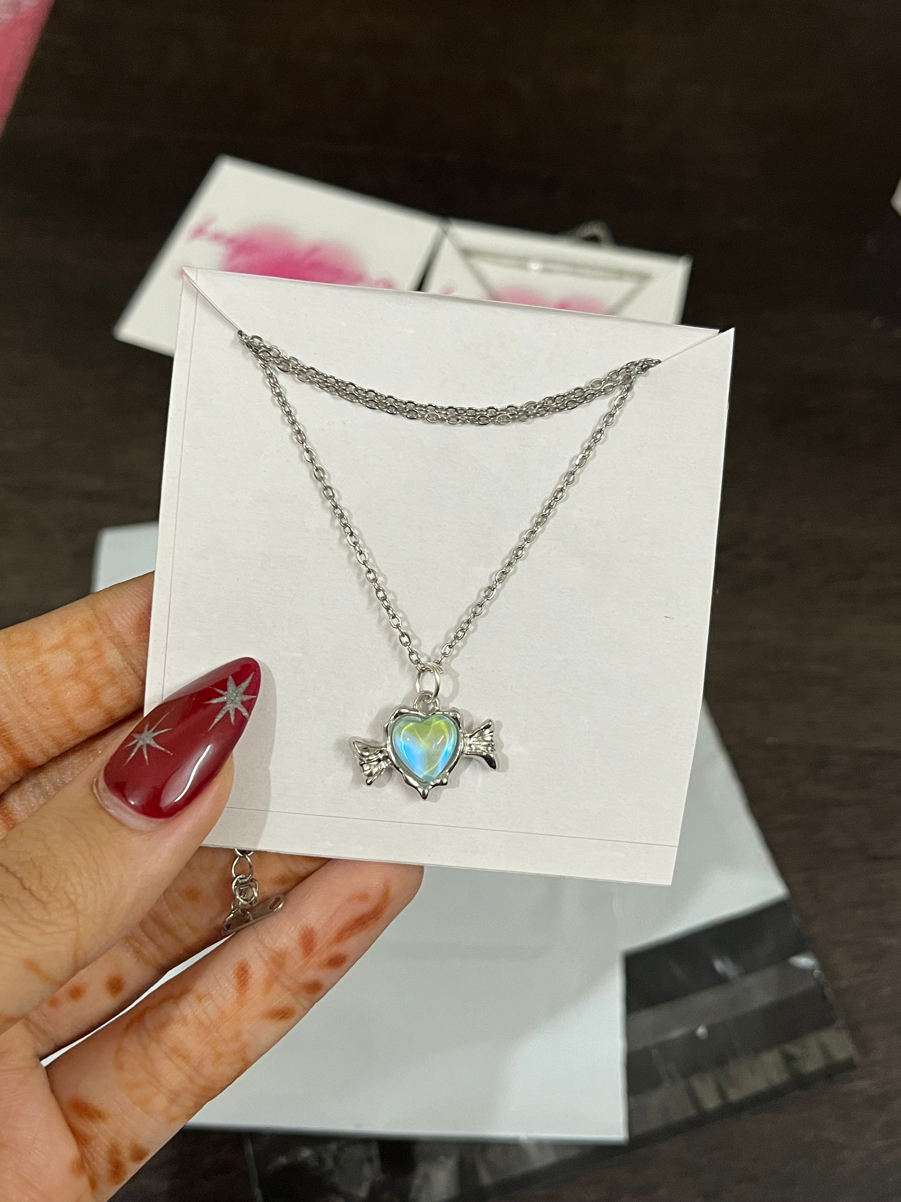 sea green heart wings chain