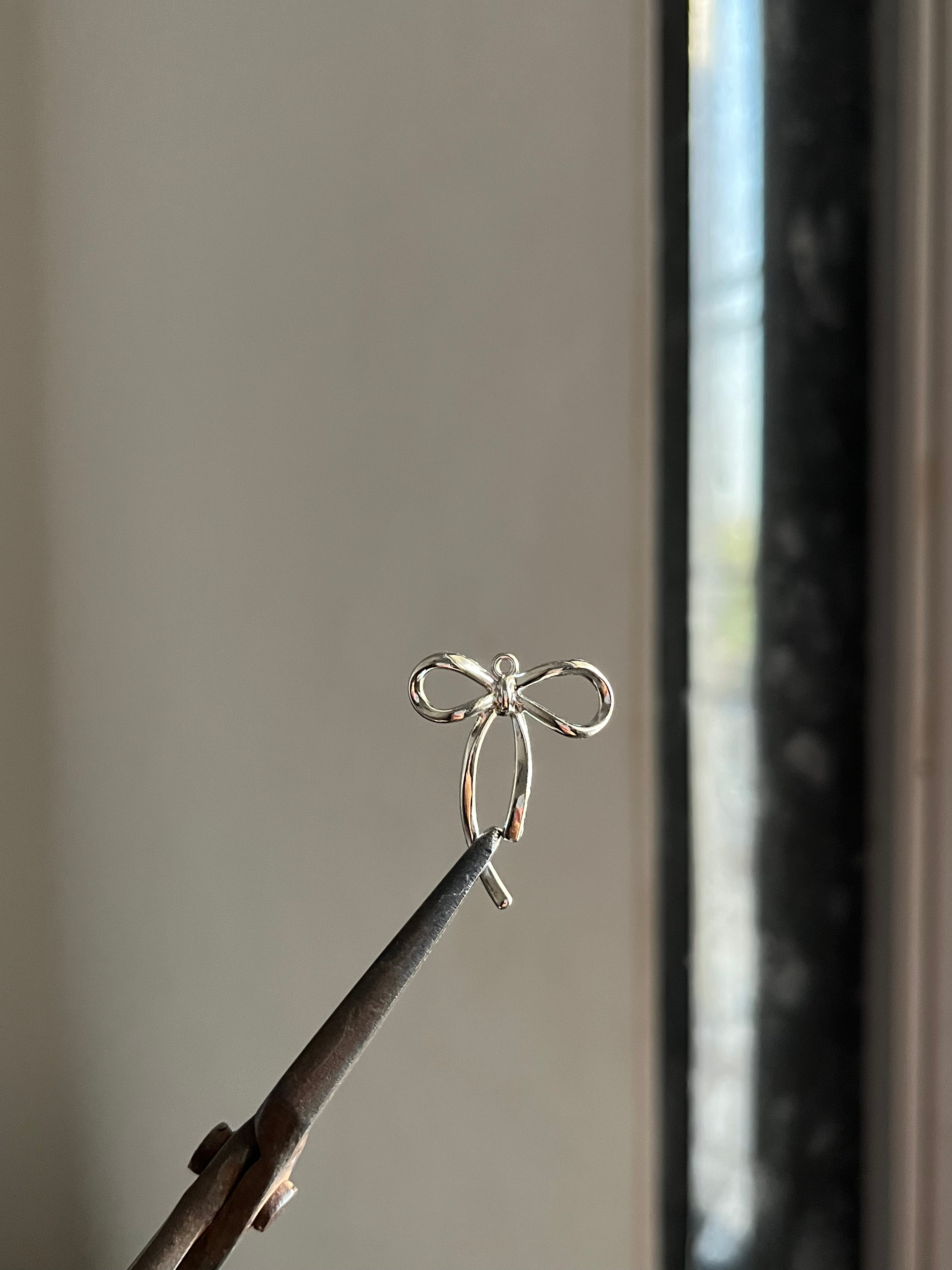 angelia bow charm