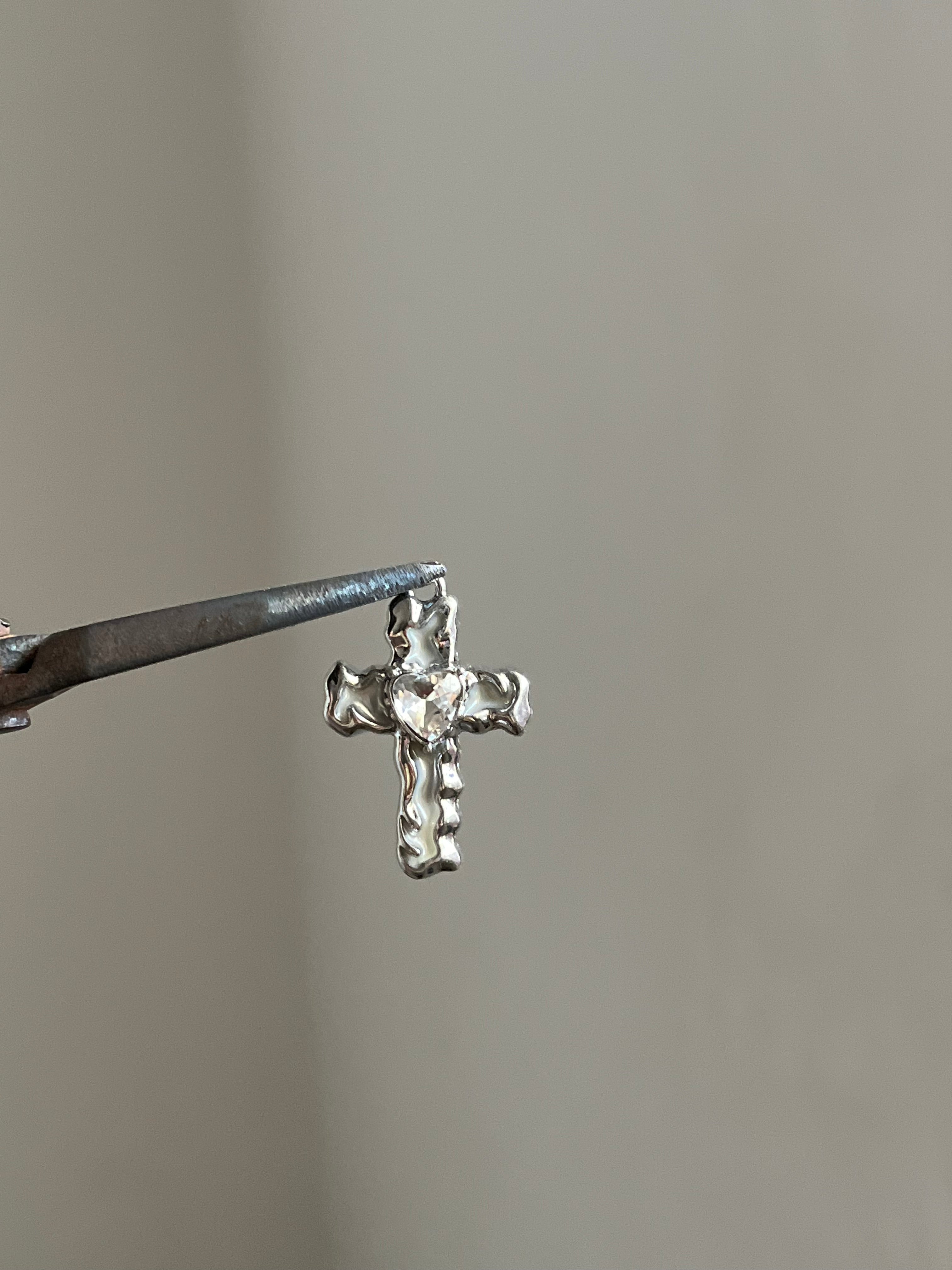 silver lumi cross charm