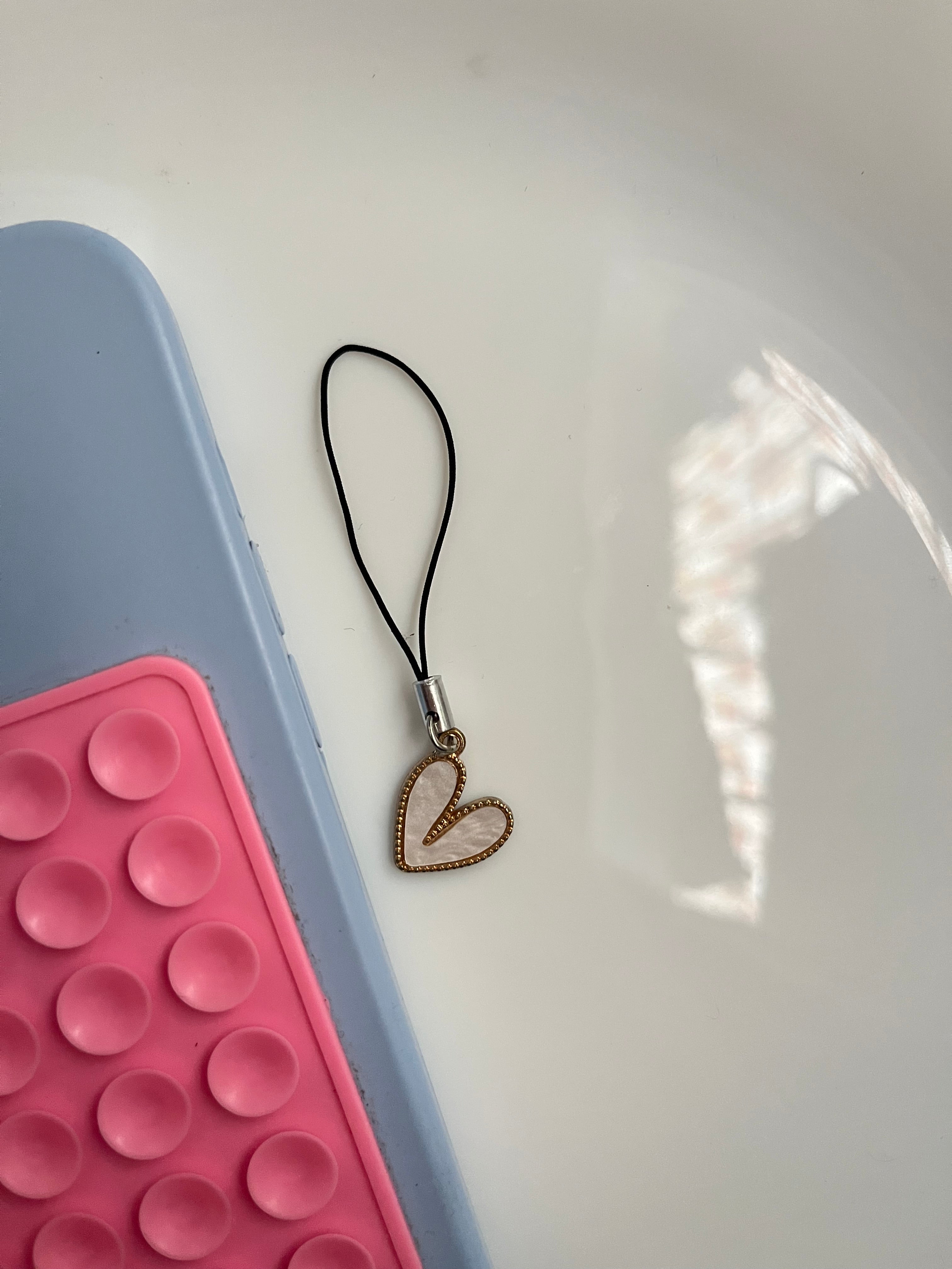 white heart phone hanging
