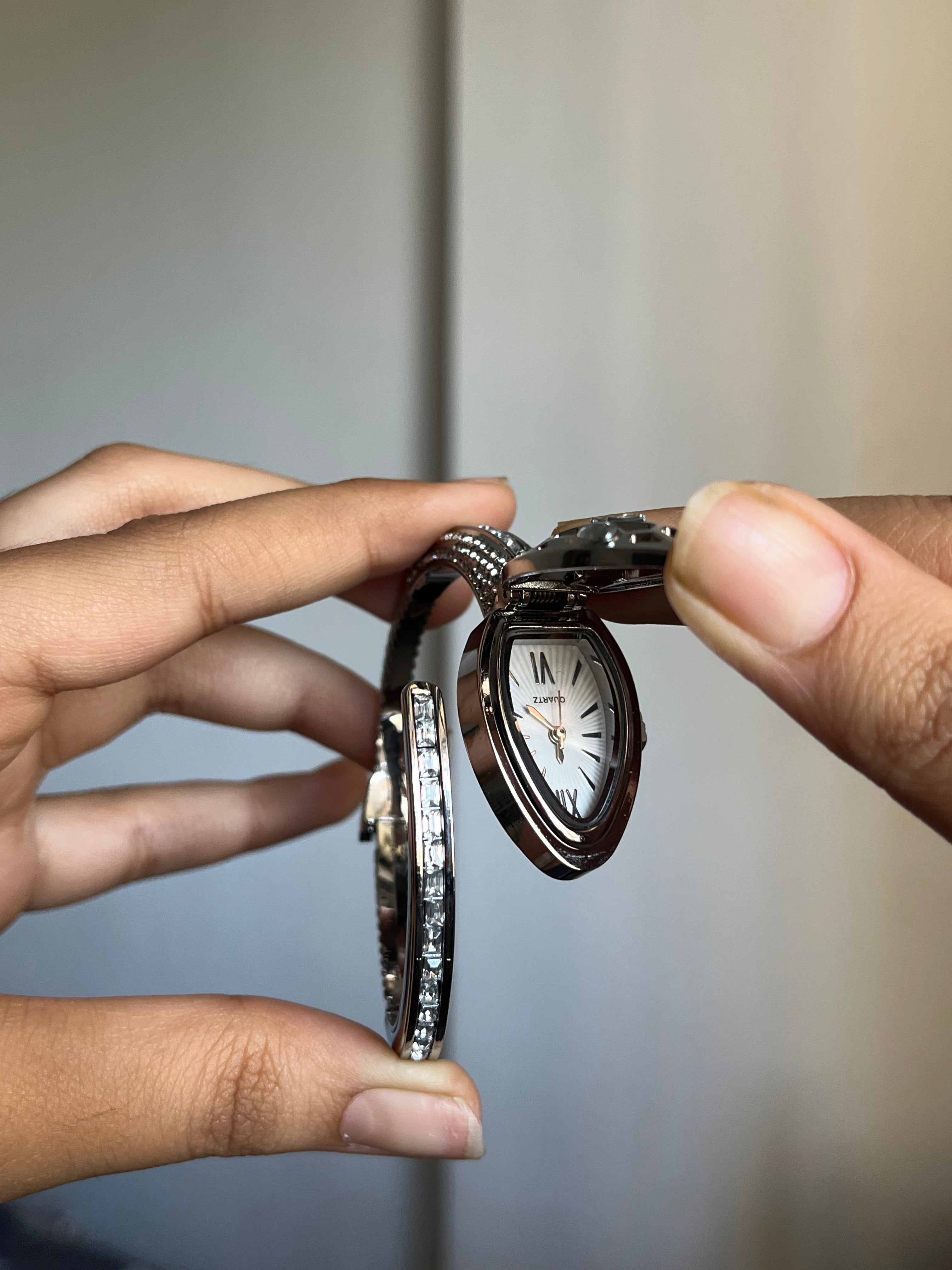 silver openable snake watch