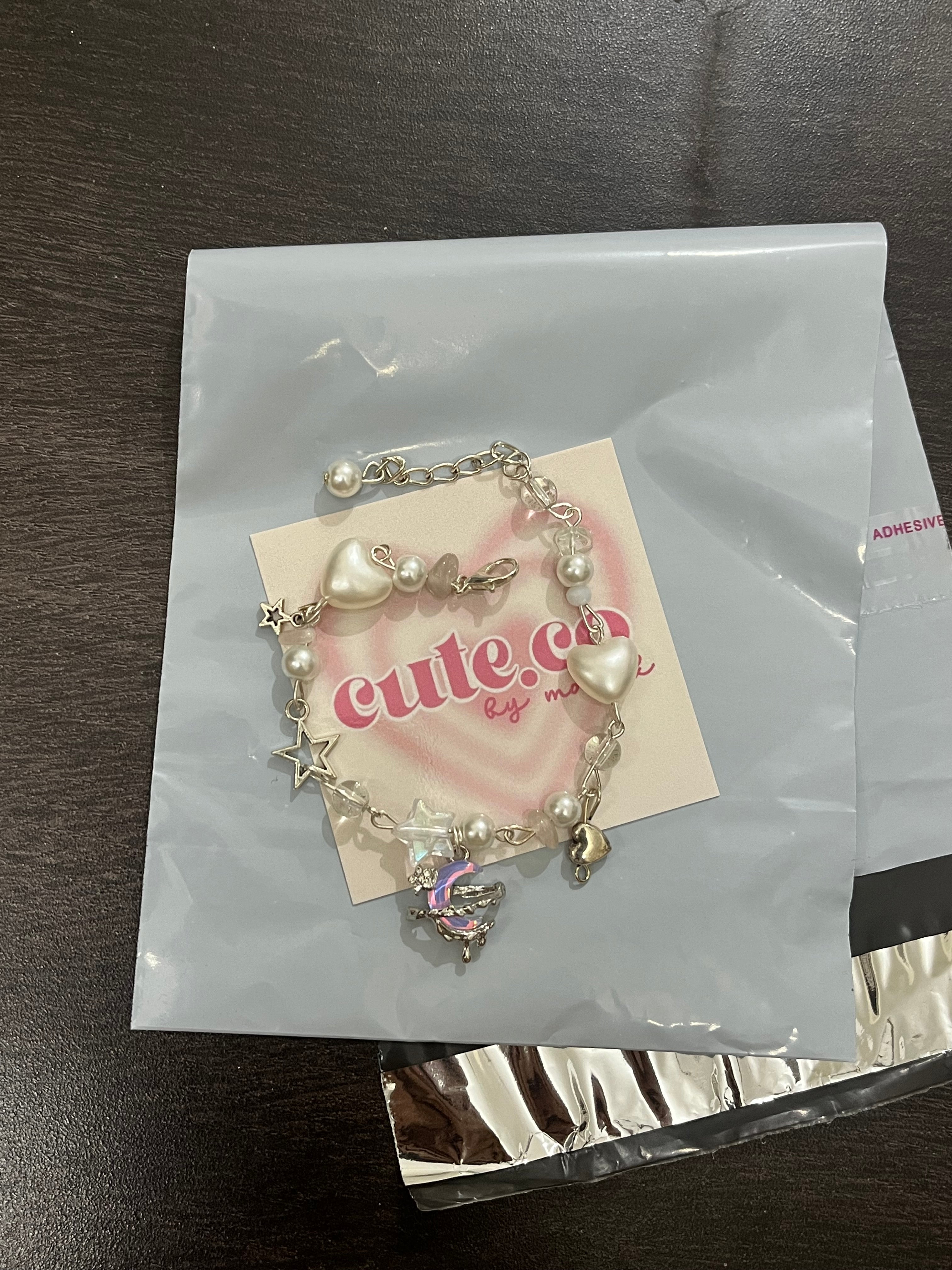 pink drippy moon coquette bracelet