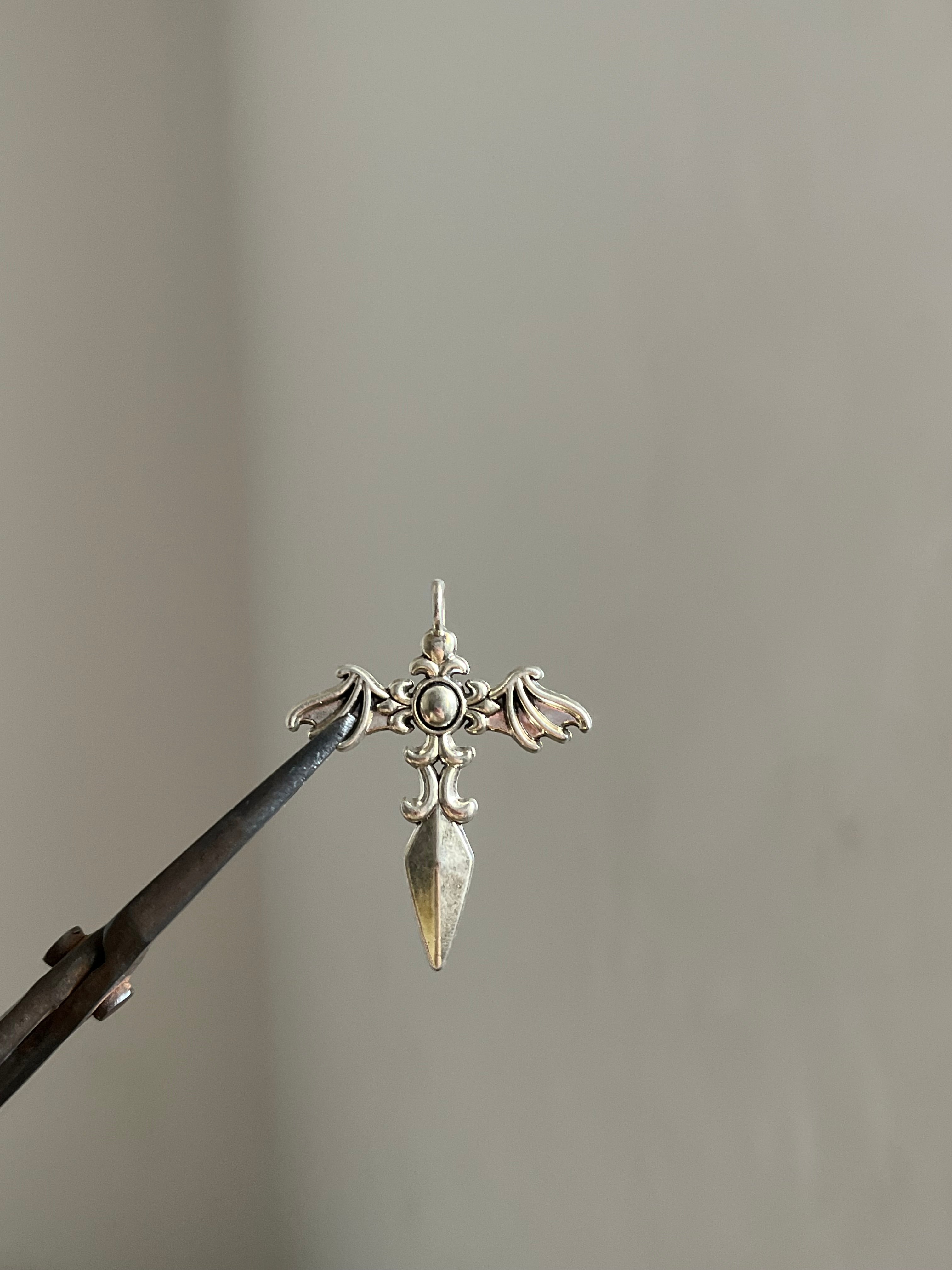 dagger cross charm