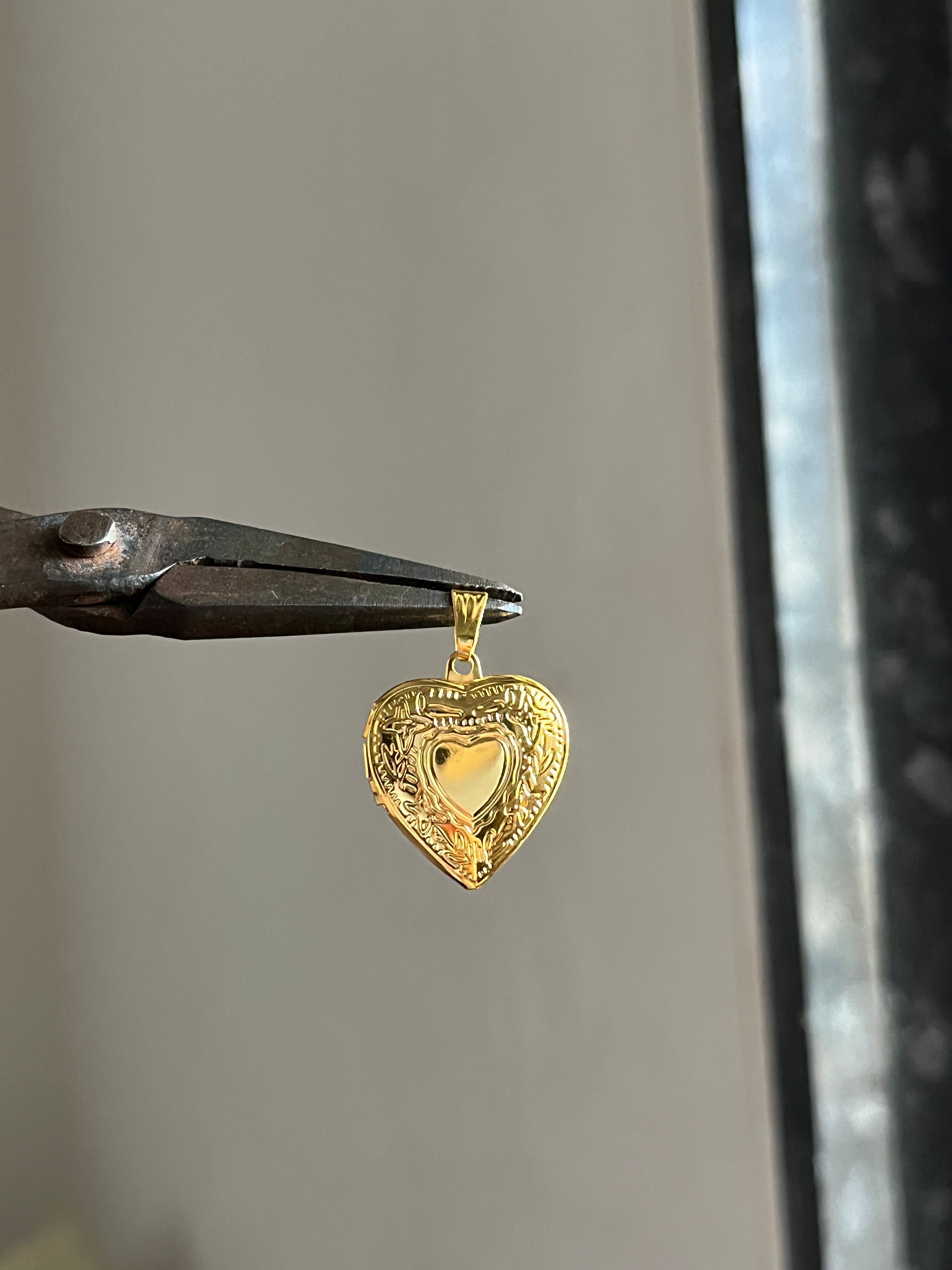 golden photo locket charm