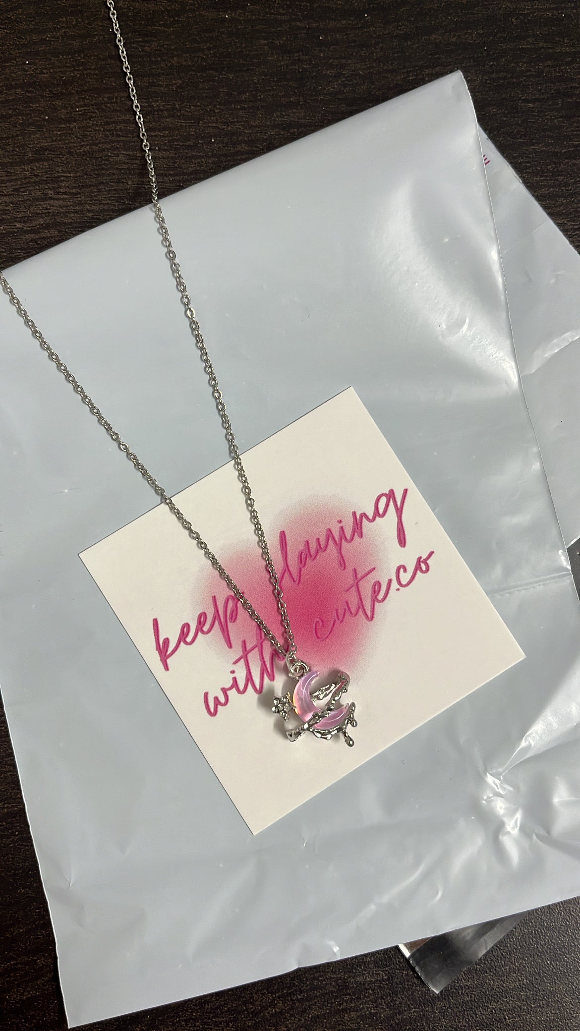 pink drippy moon chain