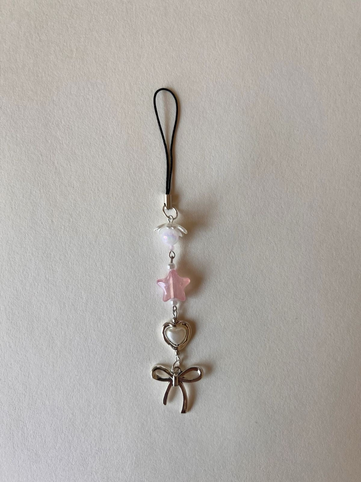 hanging bow phone charm
