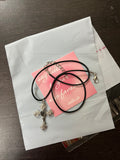 might black cross cord chain