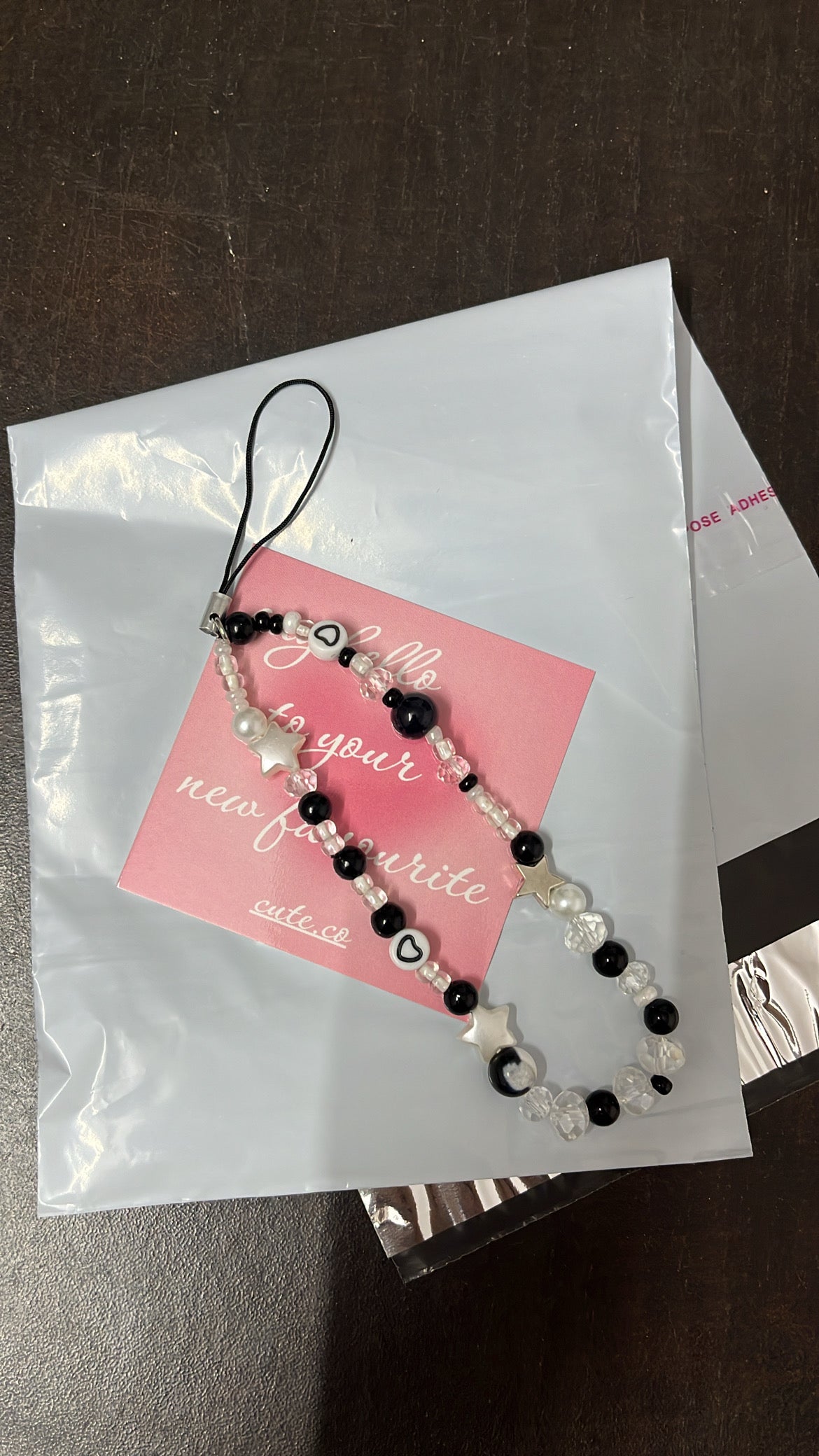 black themed phone charm